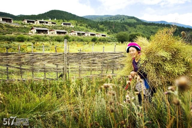 FH_061006_Hero_Exterior_Lady Carrying Hay_KUC7315.jpg